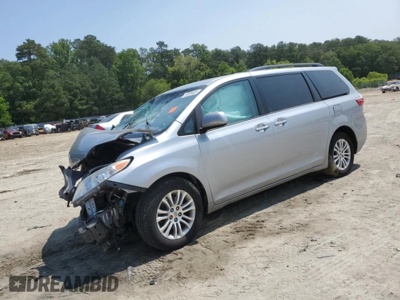 2015 Toyota Sienna XLE with VIN 5TDYK3DC9FS559460, listed as a Copart auction lot 59599405 with Not provided miles and Salvage title. Bid and sale history available at DreamBid. Image 1.