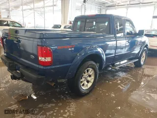 2011 Ford Ranger XLT with VIN 1FTLR4FE3BPA52049, listed as a IAAI auction lot 41394422 with 112,080 mi miles. Bid and sale history available at carsss.com. Image 4.