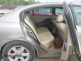 2002 Nissan Altima SL z VIN 1N4AL11D42C286462, wystawiony jako IAAI lot #42442458 z przebiegiem 142 053 mil mil oraz . Historia ofert i sprzedaży dostępna na DreamBid. Obrazek 8.