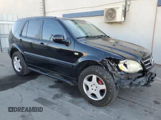 2001 Mercedes-Benz M-Class AMG with VIN 4JGAB74E71A223107, listed as a Copart auction lot 85156594 with 184,928 mi miles and Salvage Title. Bid and sale history available at carsss.com. Image 4.