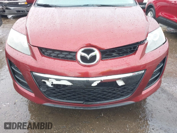 2010 Mazda CX-7 Sport with VIN JM3ER2W54A0319971, listed as a IAAI auction lot 41963026 with 121,213 mi miles and . Bid and sale history available at DreamBid. Image 6.