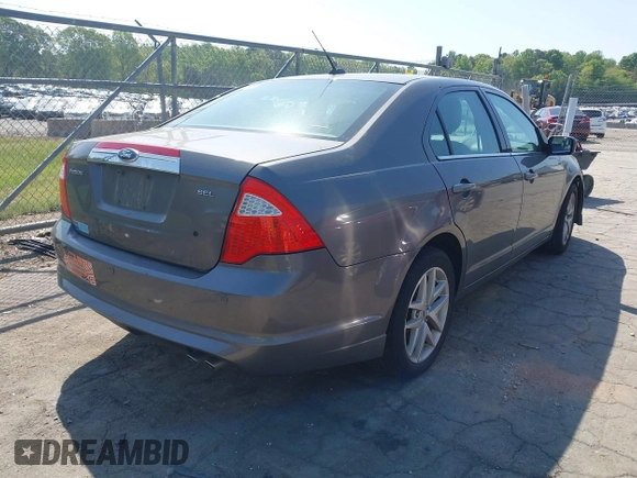 2012 Ford Fusion SEL with VIN 3FAHP0JAXCR243735, listed as a IAAI auction lot 42023783 with 235,434 mi miles. Bid and sale history available at carsss.com. Image 4.