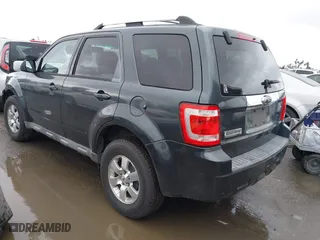 2009 Ford Escape Limited with VIN 1FMCU04759KB64236, listed as a IAAI auction lot 41796461 with 214,949 mi miles. Bid and sale history available at carsss.com. Image 3.