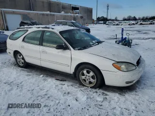 2005 Ford Taurus with VIN 1FAHP58255A219979, listed as a Copart auction lot 41699265 with 137,804 mi miles and Salvage title. Bid and sale history available at DreamBid. Image 4.