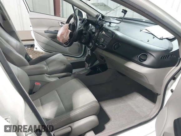 2012 Honda Insight EX with VIN JHMZE2H71CS003132, listed as a IAAI auction lot 42582548 with 112,593 mi miles and . Bid and sale history available at DreamBid. Image 5.