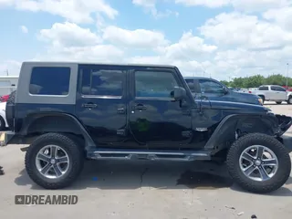 2008 Jeep Wrangler Unlimited Sahara with VIN 1J4GB59198L619802, listed as a IAAI auction lot 42361793 with 272,295 mi miles and . Bid and sale history available at DreamBid. Image 14.