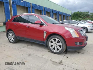 2014 Cadillac SRX Performance Collection z VIN 3GYFNFE38ES560229, wystawiony jako Copart lot #58025485 z przebiegiem 170 344 mil mil oraz Tytuł czysty. Historia ofert i sprzedaży dostępna na DreamBid. Obrazek 4.
