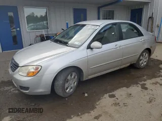 2008 Kia Spectra EX with VIN KNAFE121285556037, listed as a Copart auction lot 64837635 with 175,649 mi miles and Salvage title. Bid and sale history available at DreamBid. Image 1.