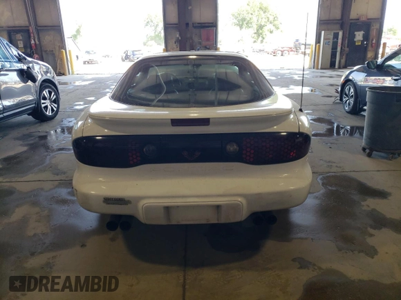 2001 Pontiac Firebird Formula z VIN 2G2FV22G212134322, wystawiony jako Copart lot #70813194 z przebiegiem Nie podano mil oraz Szkoda całkowita • Salvage title. Historia ofert i sprzedaży dostępna na DreamBid. Obrazek 6.