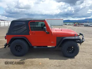 2005 Jeep Wrangler X with VIN 1J4FA39S35P358201, listed as a IAAI auction lot 42080407 with 130,110 mi miles. Bid and sale history available at carsss.com. Image 14.