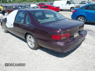 1995 Chevrolet Caprice z VIN 1G1BL52P1SR136345, wystawiony jako IAAI lot #42295367 z przebiegiem 37 725 mil mil oraz . Historia ofert i sprzedaży dostępna na DreamBid. Obrazek 3.