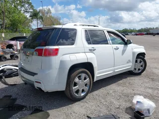 2014 GMC Terrain Denali z VIN 2GKFLUE38E6229864, wystawiony jako IAAI lot #41568159 z przebiegiem 139 818 mil mil oraz . Historia ofert i sprzedaży dostępna na DreamBid. Obrazek 4.