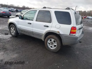 2002 Ford Escape XLT Choice with VIN 1FMYU04142KD82594, listed as a IAAI auction lot 41574646 with 173,174 mi miles. Bid and sale history available at carsss.com. Image 3.