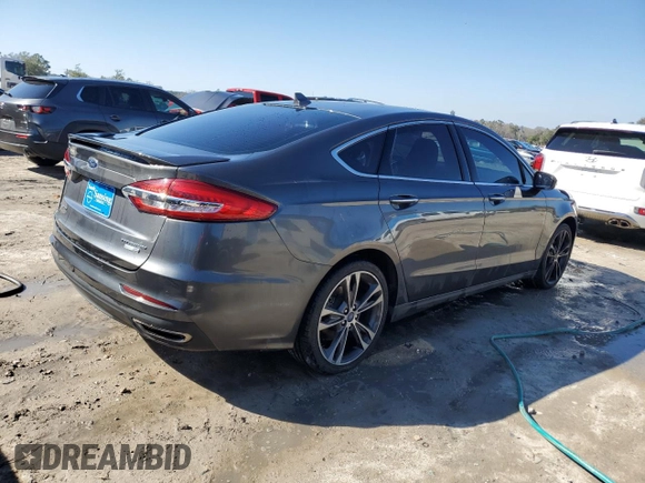 2020 Ford Fusion Titanium with VIN 3FA6P0D91LR152197, listed as a Copart auction lot 45583015 with 91,614 mi miles and Non repairable. Bid and sale history available at DreamBid. Image 3.