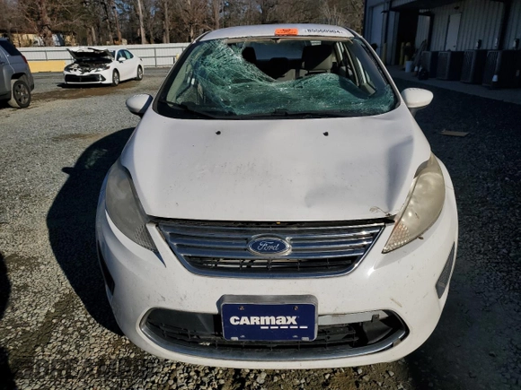 2012 Ford Fiesta SE with VIN 3FADP4BJ3CM101275, listed as a Copart auction lot 85560904 with 101,169 mi miles and Salvage Title. Bid and sale history available at DreamBid. Image 5.