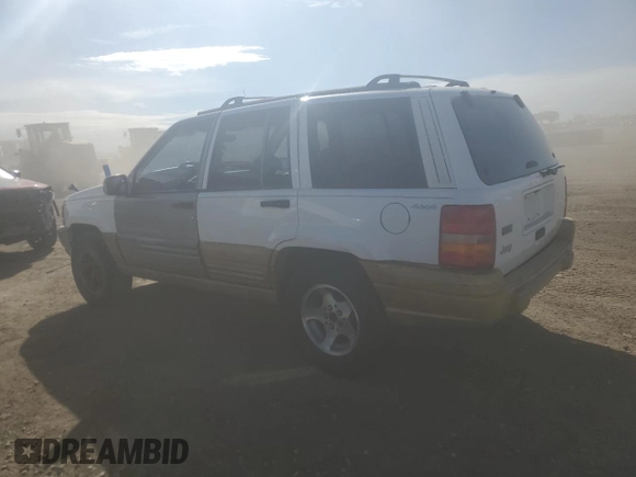 1998 Jeep Grand Cherokee Laredo with VIN 1J4GZ58S9WC361042, listed as a Copart auction lot 46802365 with 236,923 mi miles and Salvage Title. Bid and sale history available at carsss.com. Image 2.