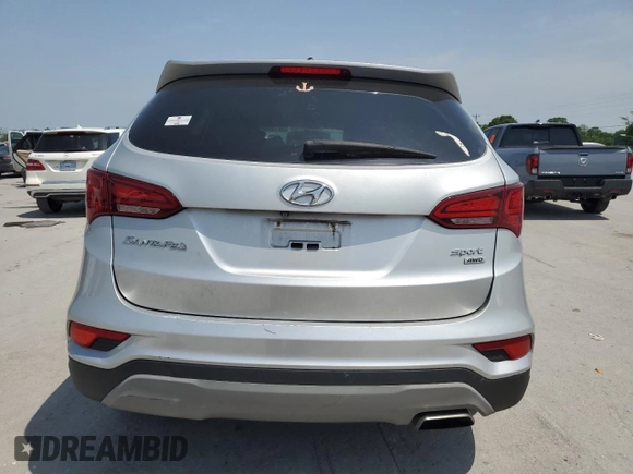 2018 Hyundai Santa Fe 2.4L z VIN 5XYZTDLB5JG551524, wystawiony jako Copart lot #57170985 z przebiegiem 139 248 mil mil oraz Szkoda całkowita • Salvage title. Historia ofert i sprzedaży dostępna na DreamBid. Obrazek 6.