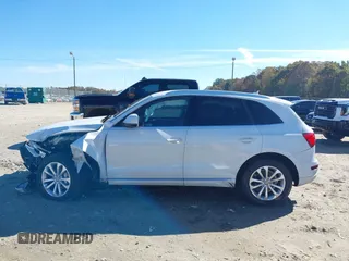 2014 Audi Q5 Premium z VIN WA1CFAFP0EA061818, wystawiony jako IAAI lot #40845361 z przebiegiem 166 333 mil mil oraz . Historia ofert i sprzedaży dostępna na DreamBid. Obrazek 14.