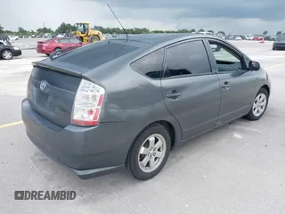 2006 Toyota Prius z VIN JTDKB20U567081644, wystawiony jako IAAI lot #42328410 z przebiegiem 138 708 mil mil oraz . Historia ofert i sprzedaży dostępna na DreamBid. Obrazek 4.