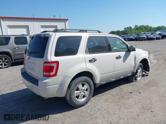 2012 Ford Escape XLT with VIN 1FMCU0D71CKC60534, listed as a IAAI auction lot 39305965 with 120,198 mi miles and . Bid and sale history available at DreamBid. Image 4.