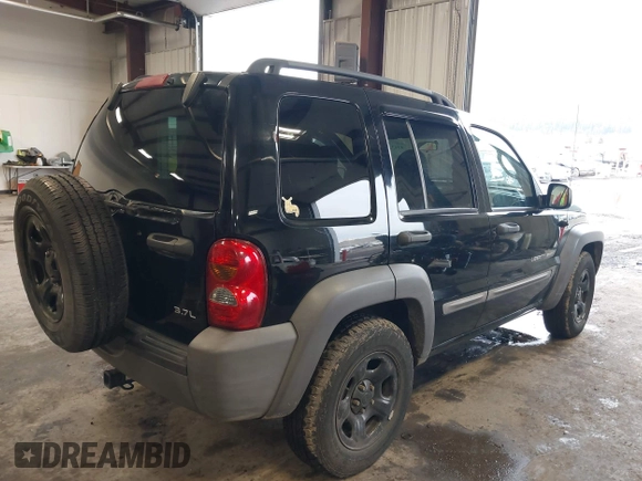 2003 Jeep Liberty Sport with VIN 1J4GL48K53W583860, listed as a IAAI auction lot 41632528 with 162,235 mi miles. Bid and sale history available at carsss.com. Image 4.