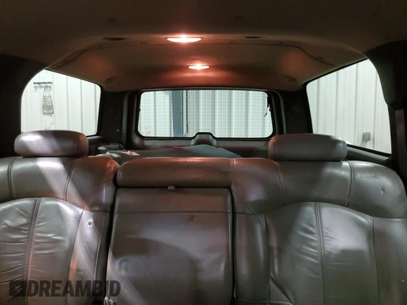 2002 Chevrolet Suburban LT with VIN 1GNFK16Z82J227408, listed as a Copart auction lot 71229194 with 304,713 mi miles and Salvage Title. Bid and sale history available at carsss.com. Image 10.