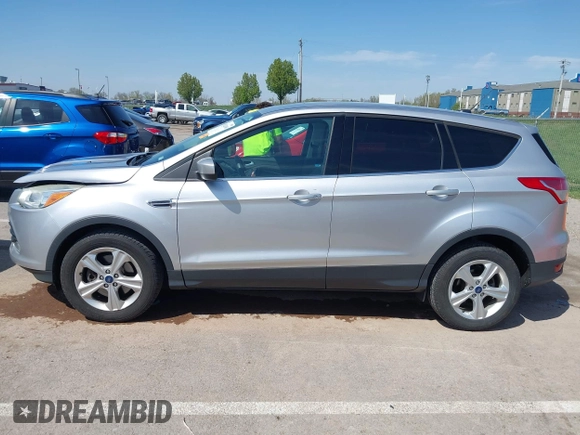 2016 Ford Escape SE with VIN 1FMCU9G98GUA10333, listed as a IAAI auction lot 42021490 with 128,973 mi miles. Bid and sale history available at carsss.com. Image 15.