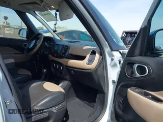 2014 FIAT 500L Lounge with VIN ZFBCFACH4EZ029817, listed as a IAAI auction lot 41909849 with 113,056 mi miles and . Bid and sale history available at DreamBid. Image 5.