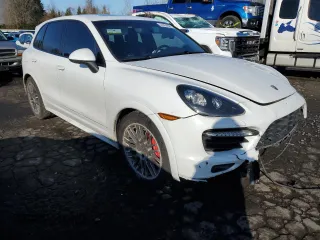 2014 Porsche Cayenne GTS with VIN WP1AD2A24ELA78001, listed as a Copart auction lot 44454895 with 69,425 mi miles and Salvage title. Bid and sale history available at DreamBid. Image 4.