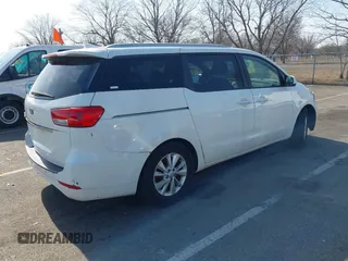 2016 Kia Sedona LX with VIN KNDMB5C18G6119709, listed as a IAAI auction lot 41814349 with 132,329 mi miles. Bid and sale history available at carsss.com. Image 4.