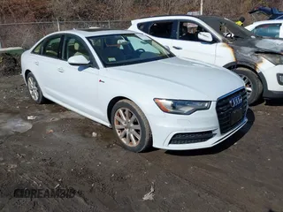 2012 Audi A6 3.0T Prestige with VIN WAUHGAFC2CN093047, listed as a IAAI auction lot 41623434 with 106,828 mi miles. Bid and sale history available at carsss.com. Image 1.