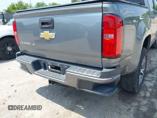 2018 Chevrolet Colorado 4WD Z71 with VIN 1GCGTDENXJ1247717, listed as a IAAI auction lot 42557264 with 91,463 mi miles and . Bid and sale history available at DreamBid. Image 6.