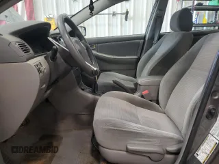 2007 Toyota Corolla CE with VIN 1NXBR32E57Z869779, listed as a Copart auction lot 52395595 with 168,794 mi miles and Clean Title. Bid and sale history available at DreamBid. Image 7.