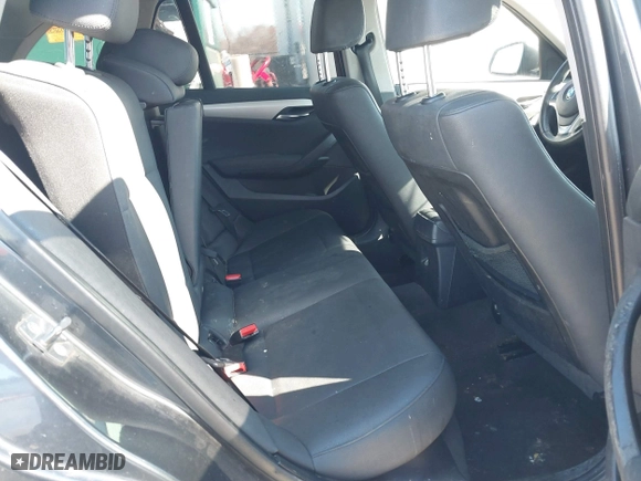 2014 BMW X1 sDrive28i with VIN WBAVM1C57EVW52502, listed as a IAAI auction lot 41702746 with 165,089 mi miles. Bid and sale history available at carsss.com. Image 8.