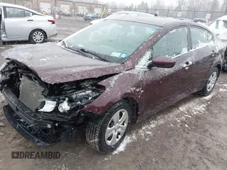 2017 Kia Forte LX with VIN 3KPFK4A7XHE071992, listed as a IAAI auction lot 42039101 with 76,682 mi miles. Bid and sale history available at carsss.com. Image 2.