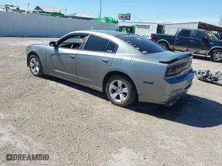 2014 Dodge Charger SE with VIN 2C3CDXBG1EH168709, listed as a IAAI auction lot 41872541 with 137,877 mi miles. Bid and sale history available at carsss.com. Image 3.