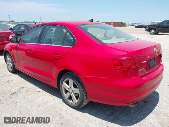 2013 Volkswagen Jetta TDI w/Premium with VIN 3VW3L7AJ6DM287865, listed as a IAAI auction lot 42480102 with 181,677 mi miles and . Bid and sale history available at DreamBid. Image 3.