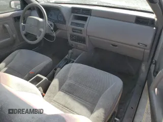 1994 Plymouth Sundance z VIN 1P3AP24D8RN181194, wystawiony jako Copart lot #48607935 z przebiegiem 90 075 mil mil oraz Tytuł czysty. Historia ofert i sprzedaży dostępna na DreamBid. Obrazek 8.