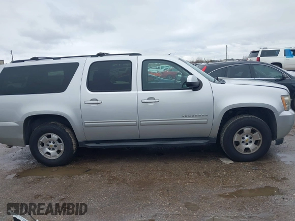2011 Chevrolet Suburban LS with VIN 1GNSCHE06BR188407, listed as a IAAI auction lot 41453215 with 232,667 mi miles. Bid and sale history available at carsss.com. Image 13.
