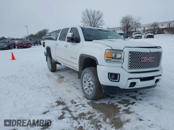 2015 GMC Sierra 2500HD available WiFi Denali with VIN 1GT120E88FF680538, listed as a IAAI auction lot 41571684 with 125,147 mi miles. Bid and sale history available at carsss.com. Image 1.