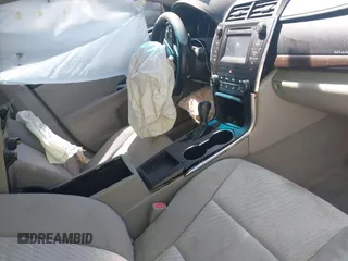 2016 Toyota Camry XLE with VIN 4T4BF1FK3GR535768, listed as a IAAI auction lot 41988698 with 157,452 mi miles. Bid and sale history available at carsss.com. Image 5.