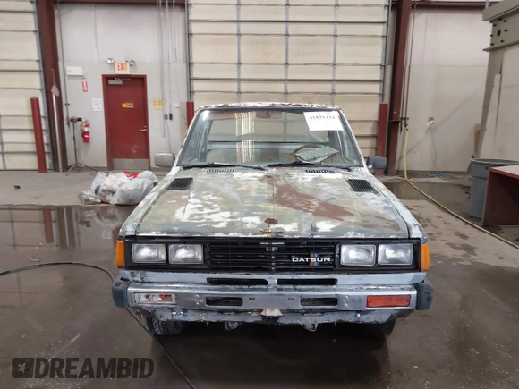 1982 Datsun 720 z VIN JN6MD01S7CW103064, wystawiony jako IAAI lot #41831434 z przebiegiem 175 954 mil mil oraz . Historia ofert i sprzedaży dostępna na DreamBid. Obrazek 11.