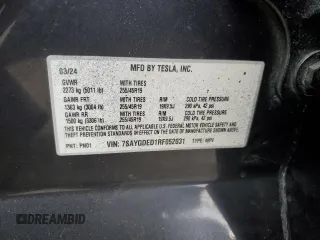 2024 Tesla Model Y with VIN 7SAYGDED1RF052031, listed as a Copart auction lot 48507865 with 5,365 mi miles and Salvage title. Bid and sale history available at DreamBid. Image 13.