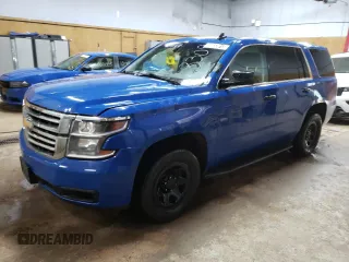 2019 Chevrolet Tahoe Commercial with VIN 1GNSKDEC7KR402729, listed as a Copart auction lot 56033015 with 122,201 mi miles and Clean title. Bid and sale history available at DreamBid. Image 1.