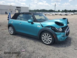 2018 MINI Convertible Cooper S with VIN WMWWG9C59J3D22587, listed as a Copart auction lot 61673415 with 34,935 mi miles and Salvage title. Bid and sale history available at DreamBid. Image 4.