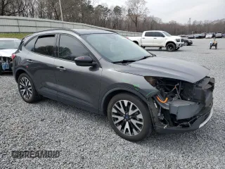 2020 Ford Escape SE Sport Hybrid with VIN 1FMCU0BZ1LUB31301, listed as a Copart auction lot 48745645 with 124,101 mi miles and Salvage Title. Bid and sale history available at carsss.com. Image 4.