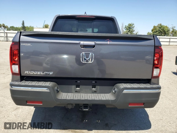 2019 Honda Ridgeline RTL-T with VIN 5FPYK2F68KB003907, listed as a Copart auction lot 61276325 with 59,612 mi miles and Salvage title. Bid and sale history available at DreamBid. Image 6.