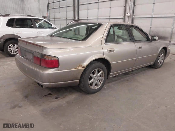 2004 Cadillac Seville Luxury SLS with VIN 1G6KS54Y74U163861, listed as a IAAI auction lot 41881291 with 215,518 mi miles. Bid and sale history available at carsss.com. Image 4.