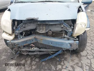 2007 Toyota Yaris z VIN JTDJT903375113576, wystawiony jako IAAI lot #41599408 z przebiegiem 192 543 mil mil oraz . Historia ofert i sprzedaży dostępna na DreamBid. Obrazek 6.