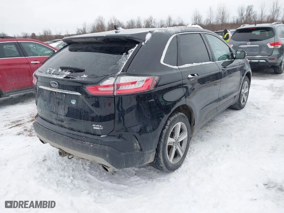2020 Ford Edge SEL with VIN 2FMPK4J9XLBA22325, listed as a IAAI auction lot 41536016 with 54,011 mi miles. Bid and sale history available at carsss.com. Image 4.